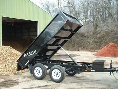 Dump Trailer 6×10 tandem axel, 7000 lb cap, easy to tow behind 1/2 ton or larger in Minnesota MN