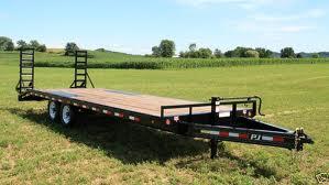 24′ Deckover Trailer.  2012 unit flatbed with ramps  in Minnesota MN